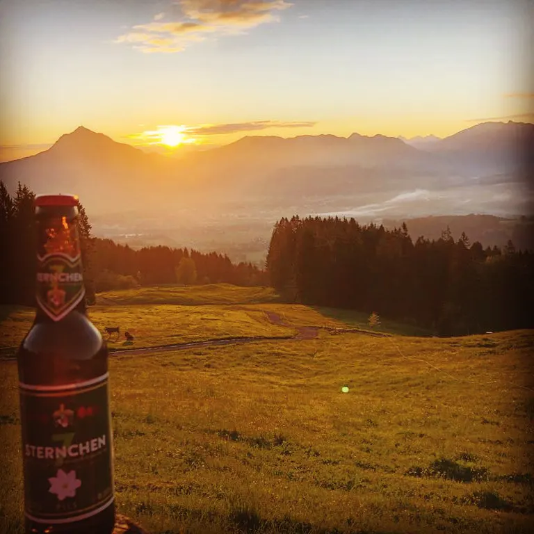 Imagefoto Siebensternchen Lang-Bräu mit Alpenvorland und Sonnenuntergang